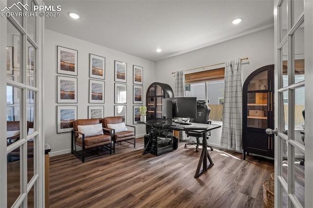 7907 Tremble Pt, Colorado Springs, CO 80908 - home office featuring french doors, dark wood-type flooring, baseboards, and recessed lighting