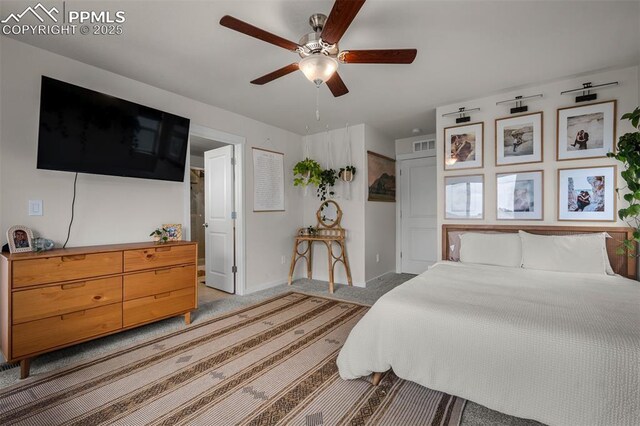 7907 Tremble Pt, Colorado Springs, CO 80908 - bedroom featuring light colored carpet, baseboards, and ceiling fan