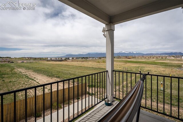 7907 Tremble Pt, Colorado Springs, CO 80908 - balcony featuring a view of countryside and a mountain view