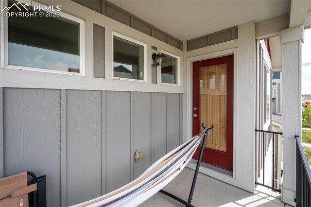 7907 Tremble Pt, Colorado Springs, CO 80908 - entrance to property featuring board and batten siding
