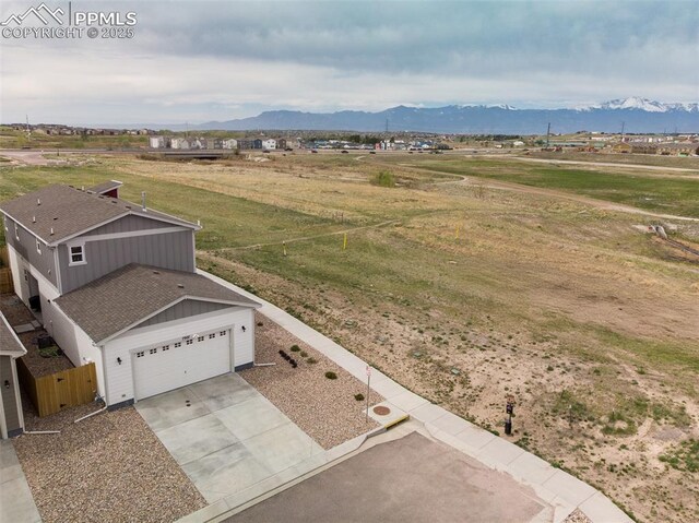 7907 Tremble Pt, Colorado Springs, CO 80908 - overview of rural landscape with a mountainous background