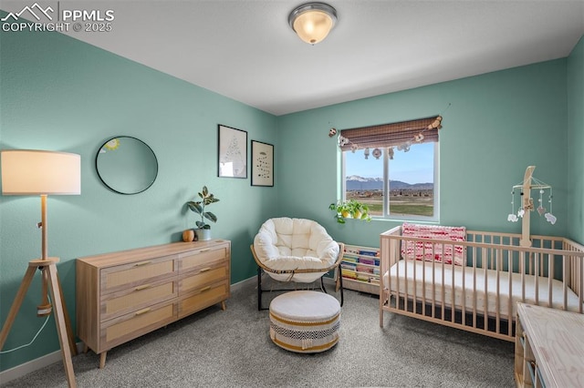 7907 Tremble Pt, Colorado Springs, CO 80908 - bedroom with a nursery area, carpet flooring, baseboards, and a mountain view