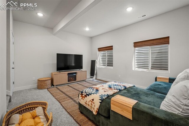 7907 Tremble Pt, Colorado Springs, CO 80908 - living room featuring baseboards, carpet floors, beamed ceiling, and recessed lighting
