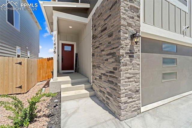 11456 Sanderling St, Colorado Springs, CO 80925 - property entrance featuring board and batten siding