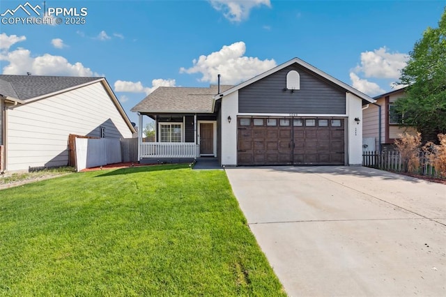 5048 Pathfinder Dr, Colorado Springs, CO 80911 - single story home with an attached garage, concrete driveway, covered porch, and roof with shingles