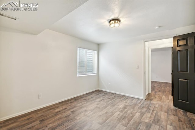 5048 Pathfinder Dr, Colorado Springs, CO 80911 - unfurnished room featuring wood finished floors and baseboards