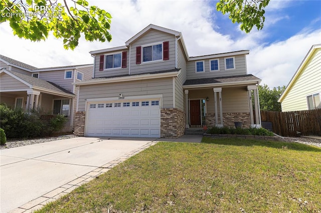 3808 Happy Jack Dr, Colorado Springs, CO 80922 - view of front of property featuring brick siding, a garage, and driveway