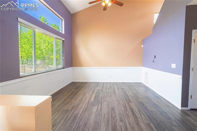 3808 Happy Jack Dr, Colorado Springs, CO 80922 - empty room featuring a ceiling fan, wood finished floors, vaulted ceiling, and baseboards