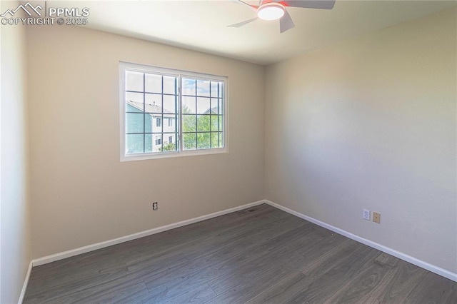 3808 Happy Jack Dr, Colorado Springs, CO 80922 - unfurnished room with dark wood-style flooring, baseboards, and ceiling fan