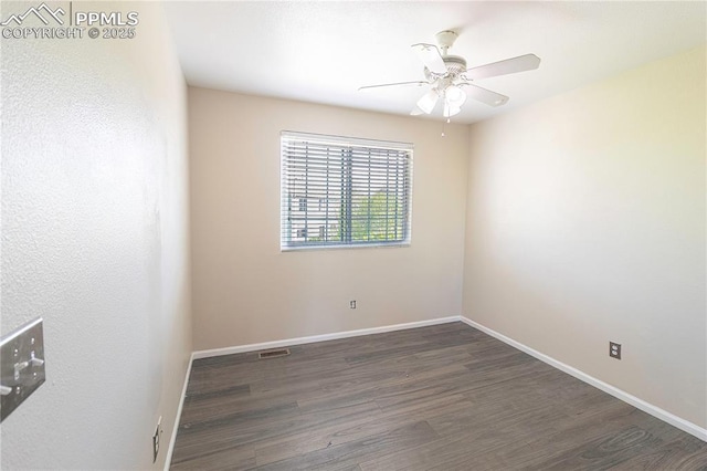 3808 Happy Jack Dr, Colorado Springs, CO 80922 - unfurnished room with wood finished floors, a ceiling fan, and baseboards