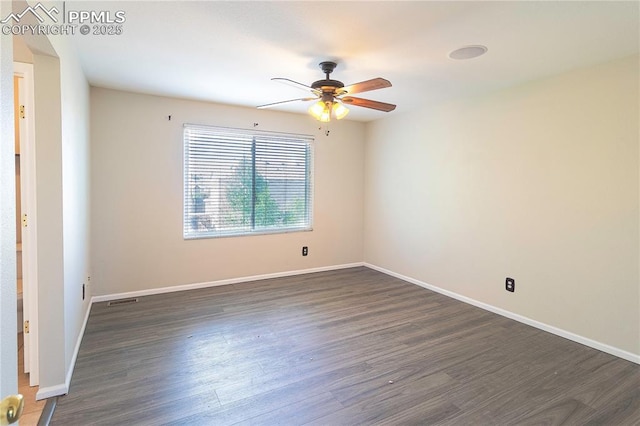 3808 Happy Jack Dr, Colorado Springs, CO 80922 - empty room featuring dark wood-style flooring, ceiling fan, and baseboards