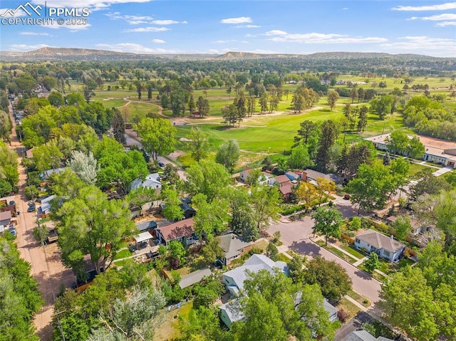 1428 N Prospect St, Colorado Springs, CO 80907 - aerial perspective of suburban area with a mountainous background and a golf course