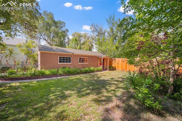 1428 N Prospect St, Colorado Springs, CO 80907 - rear view of house with stucco siding