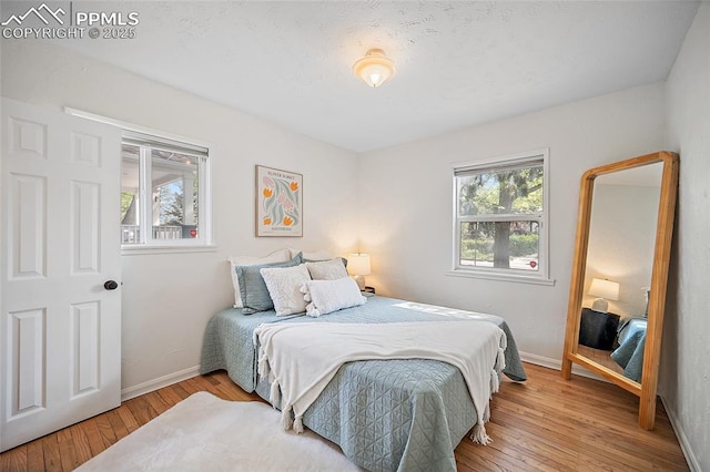 1428 N Prospect St, Colorado Springs, CO 80907 - bedroom featuring hardwood / wood-style floors and baseboards