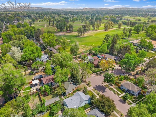 1428 N Prospect St, Colorado Springs, CO 80907 - aerial view of property and surrounding area featuring a golf course and nearby suburban area
