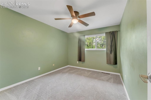445 Wintery Cir, Colorado Springs, CO 80919 - carpeted spare room with baseboards and ceiling fan