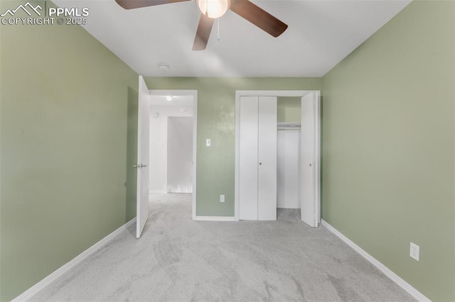 445 Wintery Cir, Colorado Springs, CO 80919 - unfurnished bedroom with carpet flooring, baseboards, a closet, and a ceiling fan