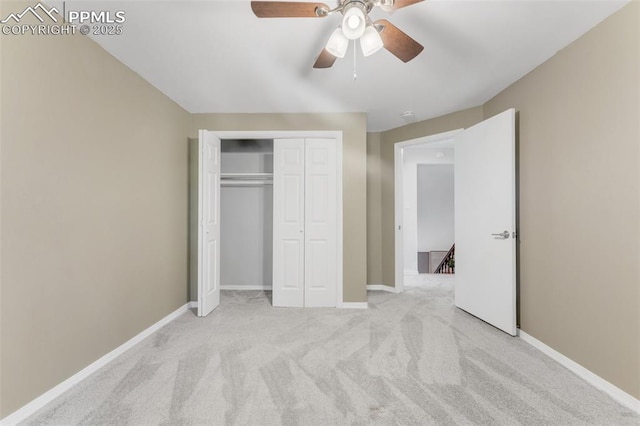 445 Wintery Cir, Colorado Springs, CO 80919 - unfurnished bedroom with carpet floors, a closet, baseboards, and ceiling fan