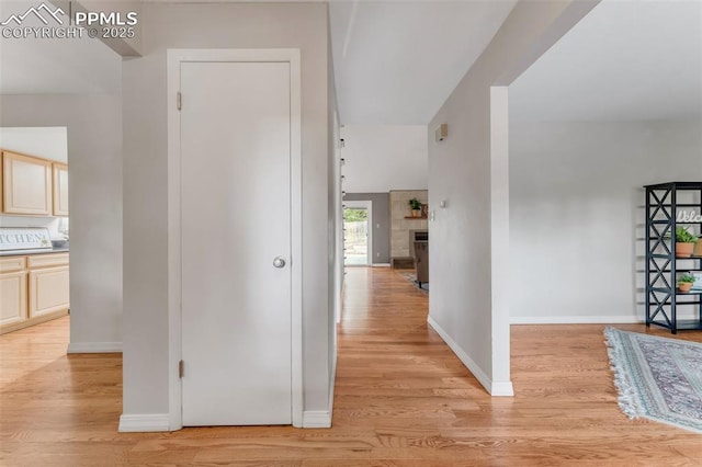 445 Wintery Cir, Colorado Springs, CO 80919 - hall with light wood finished floors and baseboards