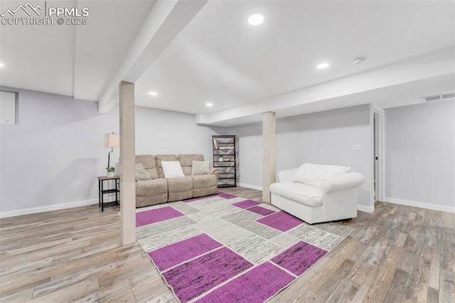 445 Wintery Cir, Colorado Springs, CO 80919 - living room featuring wood finished floors, baseboards, and recessed lighting