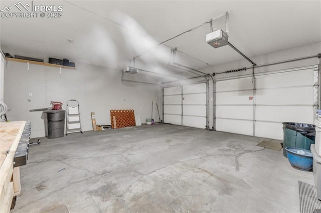 445 Wintery Cir, Colorado Springs, CO 80919 - garage with a garage door opener