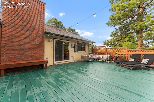 445 Wintery Cir, Colorado Springs, CO 80919 - wooden terrace with an outdoor living space