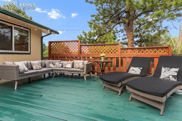 445 Wintery Cir, Colorado Springs, CO 80919 - wooden deck featuring outdoor lounge area
