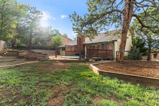445 Wintery Cir, Colorado Springs, CO 80919 - view of yard with a deck