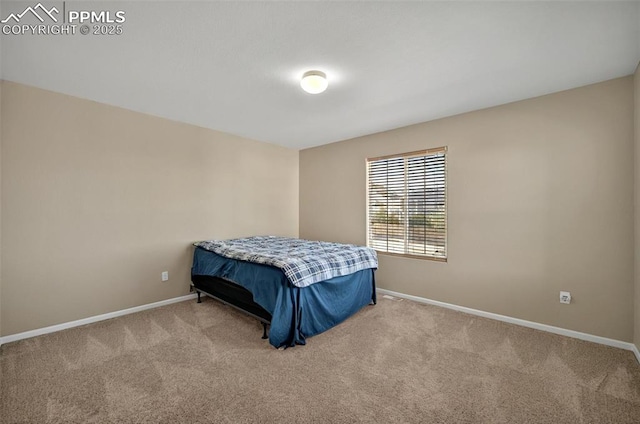 7470 Sandy Springs Pt, Fountain, CO 80817 - bedroom featuring carpet flooring and baseboards