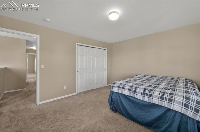 7470 Sandy Springs Pt, Fountain, CO 80817 - bedroom featuring carpet floors, baseboards, and a closet
