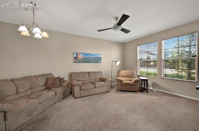 7470 Sandy Springs Pt, Fountain, CO 80817 - carpeted living room featuring a chandelier, baseboards, and a ceiling fan