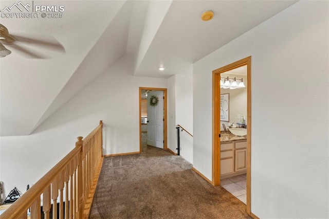921 Cottonwood Lake Dr, Divide, CO 80814 - hallway featuring an upstairs landing, light carpet, baseboards, and recessed lighting
