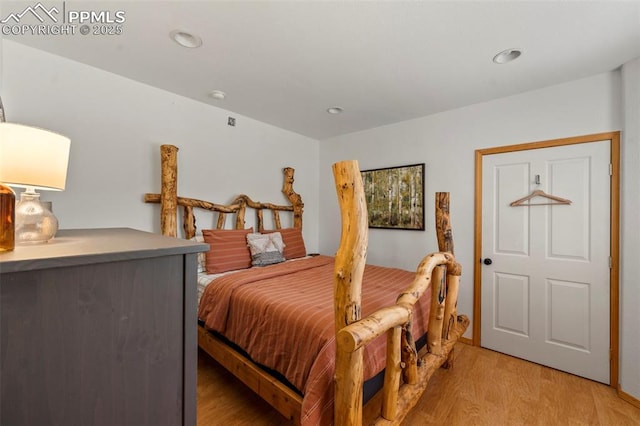921 Cottonwood Lake Dr, Divide, CO 80814 - bedroom featuring light wood-type flooring and recessed lighting