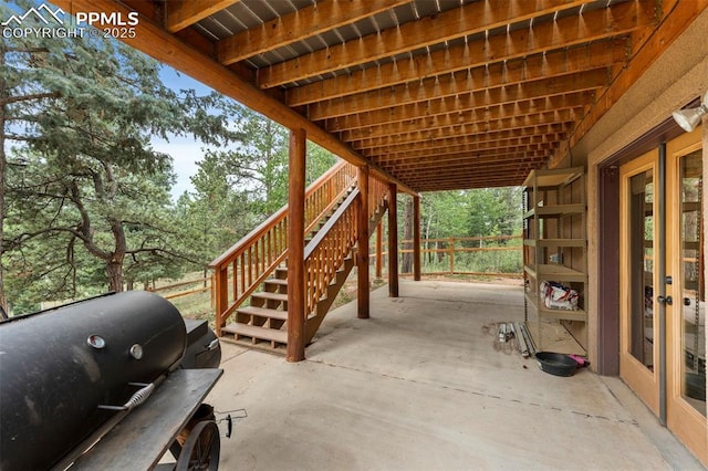 921 Cottonwood Lake Dr, Divide, CO 80814 - view of patio / terrace with stairs and a grill