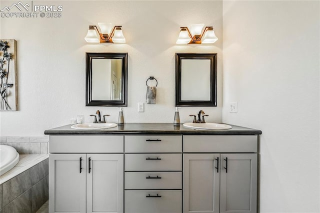 full bath with double vanity and a relaxing tiled tub