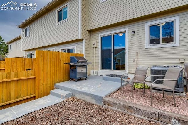 7911 Lexington Park Dr, Colorado Springs, CO 80920 - view of patio / terrace with cooling unit, area for grilling, and fence