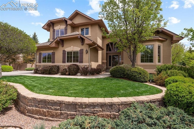 10061 Oak Knoll Ter, Colorado Springs, CO 80920 - view of front facade featuring stucco siding and stone siding