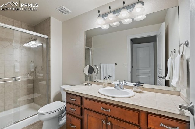 10061 Oak Knoll Ter, Colorado Springs, CO 80920 - full bath featuring a stall shower, toilet, and vanity