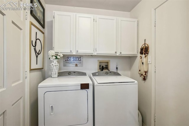 18045 Woodhaven Pl, Colorado Springs, CO 80908 - clothes washing area with cabinet space and washer and clothes dryer