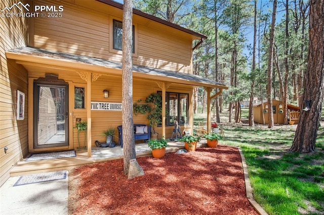 18045 Woodhaven Pl, Colorado Springs, CO 80908 - doorway to property with covered porch