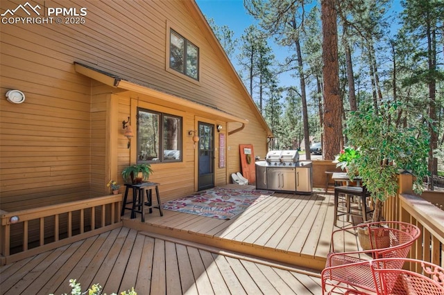 18045 Woodhaven Pl, Colorado Springs, CO 80908 - wooden terrace with area for grilling