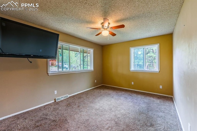 2760 Evergreen Rd, Colorado Springs, CO 80921 - carpeted empty room with ceiling fan, a textured ceiling, and baseboards