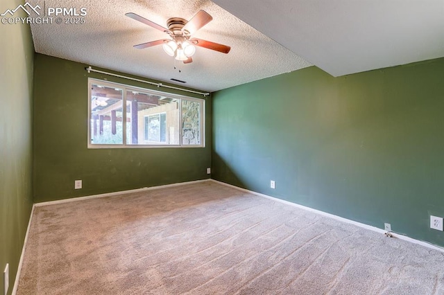 2760 Evergreen Rd, Colorado Springs, CO 80921 - carpeted empty room with ceiling fan, a textured ceiling, and baseboards