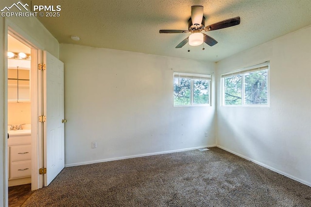 2760 Evergreen Rd, Colorado Springs, CO 80921 - carpeted empty room with a ceiling fan, a textured ceiling, a sink, and baseboards