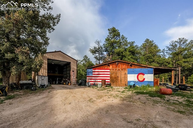 2760 Evergreen Rd, Colorado Springs, CO 80921 - view of pole building with dirt driveway