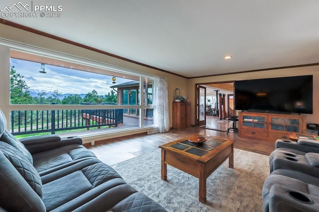 2760 Evergreen Rd, Colorado Springs, CO 80921 - living area featuring crown molding, wood finished floors, and recessed lighting