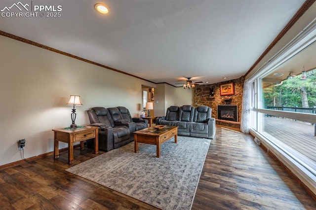 2760 Evergreen Rd, Colorado Springs, CO 80921 - living room with crown molding, a fireplace, baseboards, dark wood finished floors, and a ceiling fan