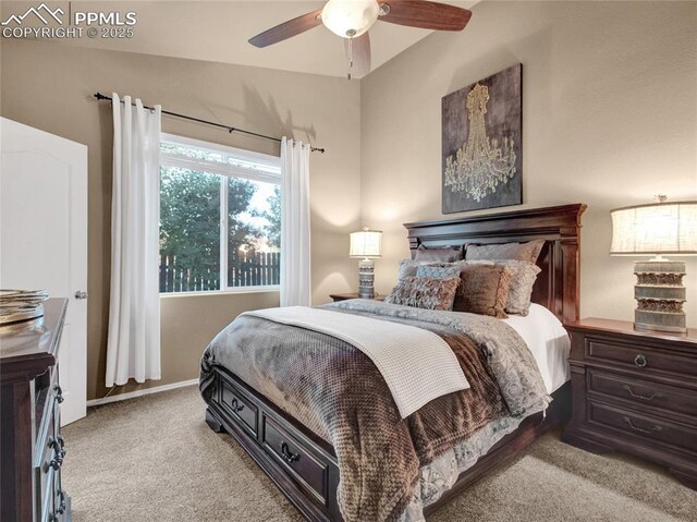 bedroom featuring carpet floors, a ceiling fan, and baseboards