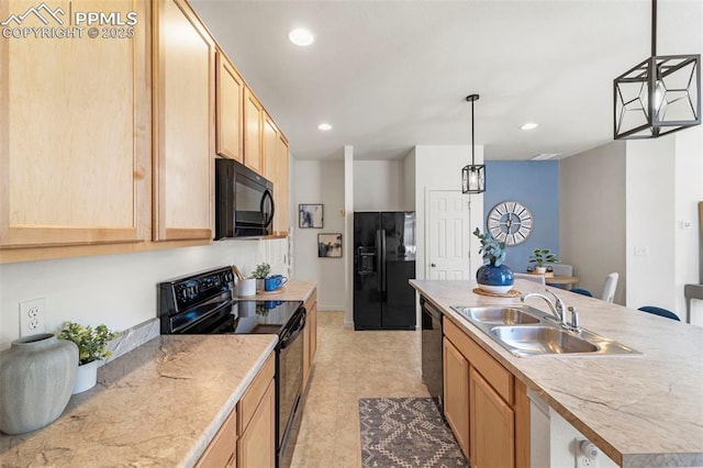 kitchen featuring black appliances, a sink, light brown cabinetry, and recessed lighting
