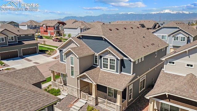 aerial perspective of suburban area with a mountain backdrop